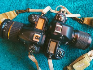 Left: Nikon D7000 (dslr) Right: Nikon F100 (35mm film) Even when the F100 is wider camera in size, its fairly slimmer than the digital D7000.